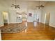 Spacious living room featuring hardwood floors and views into the kitchen at 2164 Highway 78, Dorchester, SC 29437