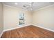 Neutral bedroom with hardwood floors, ceiling fan, recessed lighting, and window with privacy blinds at 2306 Chairmaker Ct, Charleston, SC 29414