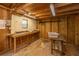 Well-organized shed interior with a workbench, shelving, and ample room at 2306 Chairmaker Ct, Charleston, SC 29414