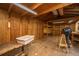 Large storage shed inside featuring wood walls, shelves, and plenty of workspace at 2306 Chairmaker Ct, Charleston, SC 29414
