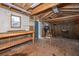 Inside the shed reveals wooden walls, workbench, and ample storage space at 2306 Chairmaker Ct, Charleston, SC 29414