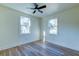 Inviting bedroom with natural light, ceiling fan, and wood-look flooring at 2314 Kent Ave, North Charleston, SC 29405