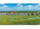 Beautiful coastal condos overlooking the waterway and marsh with blue skies in the background at 242 Little Oak Dr, Folly Beach, SC 29439