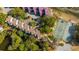 Community with condos, tennis courts, trees, and waterway at 242 Little Oak Dr, Folly Beach, SC 29439