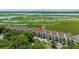 Marsh view property featuring beautiful townhomes, lush greenery, and tranquil waterways offering a serene coastal lifestyle at 242 Little Oak Dr, Folly Beach, SC 29439
