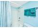 Well-lit bathroom with a combination tub and shower at 242 Little Oak Dr, Folly Beach, SC 29439