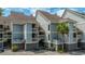 Multi-level townhome with private balconies, showcasing a modern design and inviting outdoor spaces at 242 Little Oak Dr, Folly Beach, SC 29439