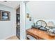 Hallway features views into the living room and a home office desk at 242 Little Oak Dr, Folly Beach, SC 29439