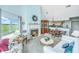 Inviting living area seamlessly connecting with the dining and kitchen spaces at 242 Little Oak Dr, Folly Beach, SC 29439