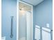 Accessible shower with grab bar and a circular shower curtain at 242 Little Oak Dr, Folly Beach, SC 29439