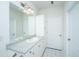 Bathroom featuring vanity with white cabinets and a framed mirror at 2522 Egret Crest Ln, Charleston, SC 29414