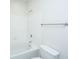 White bathroom featuring tub with tile surround and showerhead at 2522 Egret Crest Ln, Charleston, SC 29414