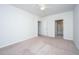 Spacious bedroom with neutral carpet, ceiling fan, and access to ensuite bathroom at 2522 Egret Crest Ln, Charleston, SC 29414