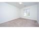 Bedroom featuring neutral carpet, ceiling fan and window with blinds at 2522 Egret Crest Ln, Charleston, SC 29414