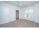 Bedroom with carpet, ceiling fan, and window, with closet at 2522 Egret Crest Ln, Charleston, SC 29414