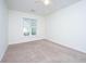 Bedroom featuring neutral carpet, ceiling fan and window with blinds at 2522 Egret Crest Ln, Charleston, SC 29414