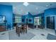 The clubhouse features tile floors, tall ceilings, tv, and multiple seating arrangements at 2522 Egret Crest Ln, Charleston, SC 29414