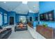 The clubhouse features tile floors, tall ceilings, tv, and multiple seating arrangements at 2522 Egret Crest Ln, Charleston, SC 29414