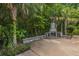 Stone outdoor fireplace offering a cozy spot to gather and relax at 2522 Egret Crest Ln, Charleston, SC 29414