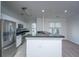 Kitchen featuring stainless steel appliances and bar seating for casual dining at 2522 Egret Crest Ln, Charleston, SC 29414
