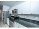 Well-equipped kitchen with stainless steel appliances and a stylish backsplash at 2522 Egret Crest Ln, Charleston, SC 29414