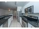 Modern kitchen seamlessly connecting with the living area, featuring sleek appliances at 2522 Egret Crest Ln, Charleston, SC 29414