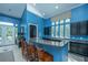Lounge featuring a long island bar and large windows at 2522 Egret Crest Ln, Charleston, SC 29414