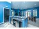 Community lounge featuring a long island bar, seating area, and large windows at 2522 Egret Crest Ln, Charleston, SC 29414