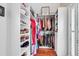 Organized walk-in closet with shelves, hanging racks, and ample storage space at 2707 Waterpointe Cir, Mount Pleasant, SC 29466