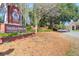 Welcome to Brickyard Plantation, a beautiful community with brick signage, lush greenery, and mature trees at 2707 Waterpointe Cir, Mount Pleasant, SC 29466