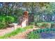 Welcome to The Landing, a beautiful community with lush landscaping, mature trees, and brick entrance at 2707 Waterpointe Cir, Mount Pleasant, SC 29466