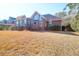 View of the back exterior of the house and landscaping at 2707 Waterpointe Cir, Mount Pleasant, SC 29466