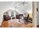Inviting home office featuring hardwood floors, vaulted ceilings, and natural light from large windows at 2707 Waterpointe Cir, Mount Pleasant, SC 29466