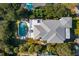 Aerial top-down view of a luxury home, showcasing the pool and surrounding landscape at 3006 Cameron Blvd, Isle of Palms, SC 29451