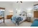 Bright bedroom featuring an alcove window, a bed with patterned covers and two bedside tables with lamps at 3006 Cameron Blvd, Isle of Palms, SC 29451