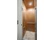 Interior of a residential elevator showcasing its wooden paneling, simple controls, and tiled floor at 3006 Cameron Blvd, Isle of Palms, SC 29451