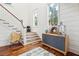 Inviting foyer with hardwood floors, a staircase and windows that provide natural light at 3006 Cameron Blvd, Isle of Palms, SC 29451