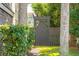 Charming gated entrance surrounded by lush greenery, adding privacy and enhancing the curb appeal of this lovely home at 3006 Cameron Blvd, Isle of Palms, SC 29451