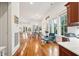 Open living space features hardwood floors, recessed lighting, and large windows at 3006 Cameron Blvd, Isle of Palms, SC 29451