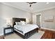 Bright main bedroom with hardwood floors, neutral decor, and contemporary furnishings at 3006 Cameron Blvd, Isle of Palms, SC 29451