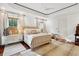 The main bedroom has hardwood floors, tray ceiling, and great lighting, providing a serene escape at 3006 Cameron Blvd, Isle of Palms, SC 29451
