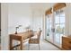 Bright office featuring a wooden desk, natural light from french doors and neutral decor at 3006 Cameron Blvd, Isle of Palms, SC 29451