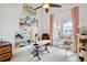 Bright office with eclectic art, french doors, and cozy seating with views of the outdoors at 3006 Cameron Blvd, Isle of Palms, SC 29451