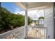 Scenic balcony view of a quiet neighborhood with lush trees and blue skies at 3105 Vanessa Lynne, Johns Island, SC 29455
