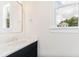 Bathroom featuring a modern vanity, a sleek mirror, and a bright window at 3105 Vanessa Lynne, Johns Island, SC 29455