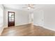 Light-filled bedroom with a wood-look floor and a private exterior door at 3105 Vanessa Lynne, Johns Island, SC 29455