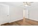 Bedroom featuring hardwood floors, a ceiling fan, and white doors at 3105 Vanessa Lynne, Johns Island, SC 29455