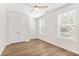 Bedroom features hardwood floors, a ceiling fan, and natural light from two large windows at 3105 Vanessa Lynne, Johns Island, SC 29455