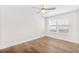 Bright bedroom featuring hardwood floors, a ceiling fan, and a window with white trim and blinds at 3105 Vanessa Lynne, Johns Island, SC 29455