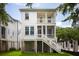 Two-story home with a screened-in porch and exterior stairs, a charming Southern-style design at 3105 Vanessa Lynne, Johns Island, SC 29455